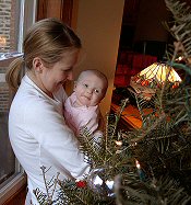 Mom and Rebecca trimming tree